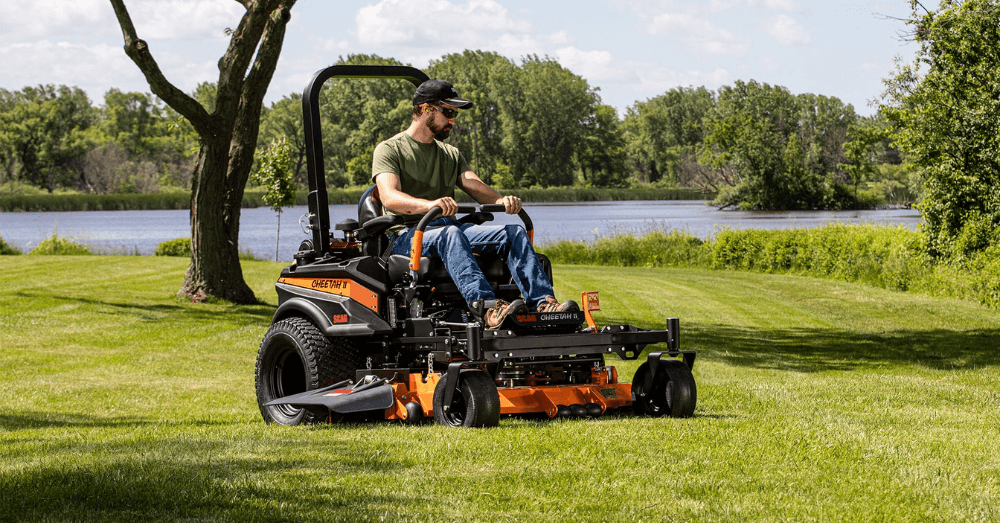 Ohio homeowner mowing lawn with rental zero-turn mower